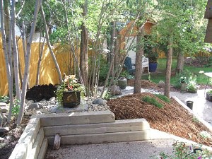 wood retaining wall, slopes, patio